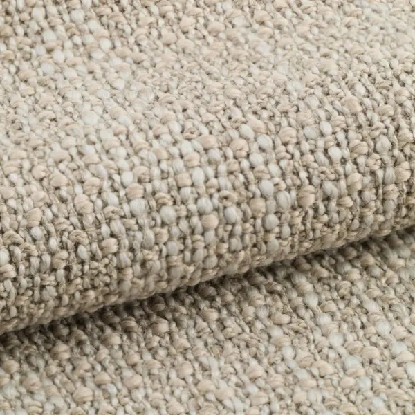 Meru upholstery fabric close-up showing a rich irregular weave with slub yarns, made from a high wool-content blend of wool, cotton, and polyamide, featuring a natural handcrafted texture, OEKOTEX certified.