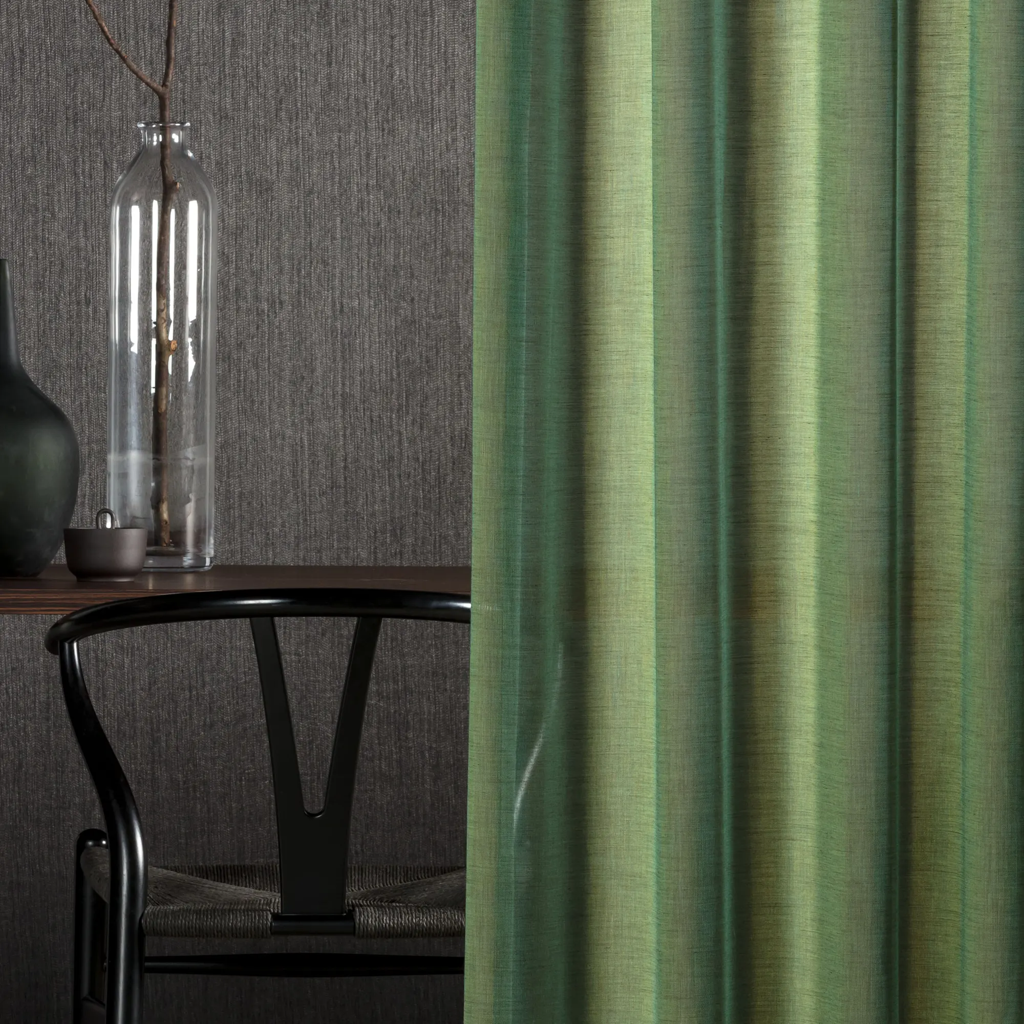 Mizu sheer curtain fabric close-up with a colorfully woven inbetween transparent texture, made from 100% Trevira CS polyester, featuring a soft natural feel with subtle shimmer and shifting yarn colors inspired by water, OEKOTEX certified.