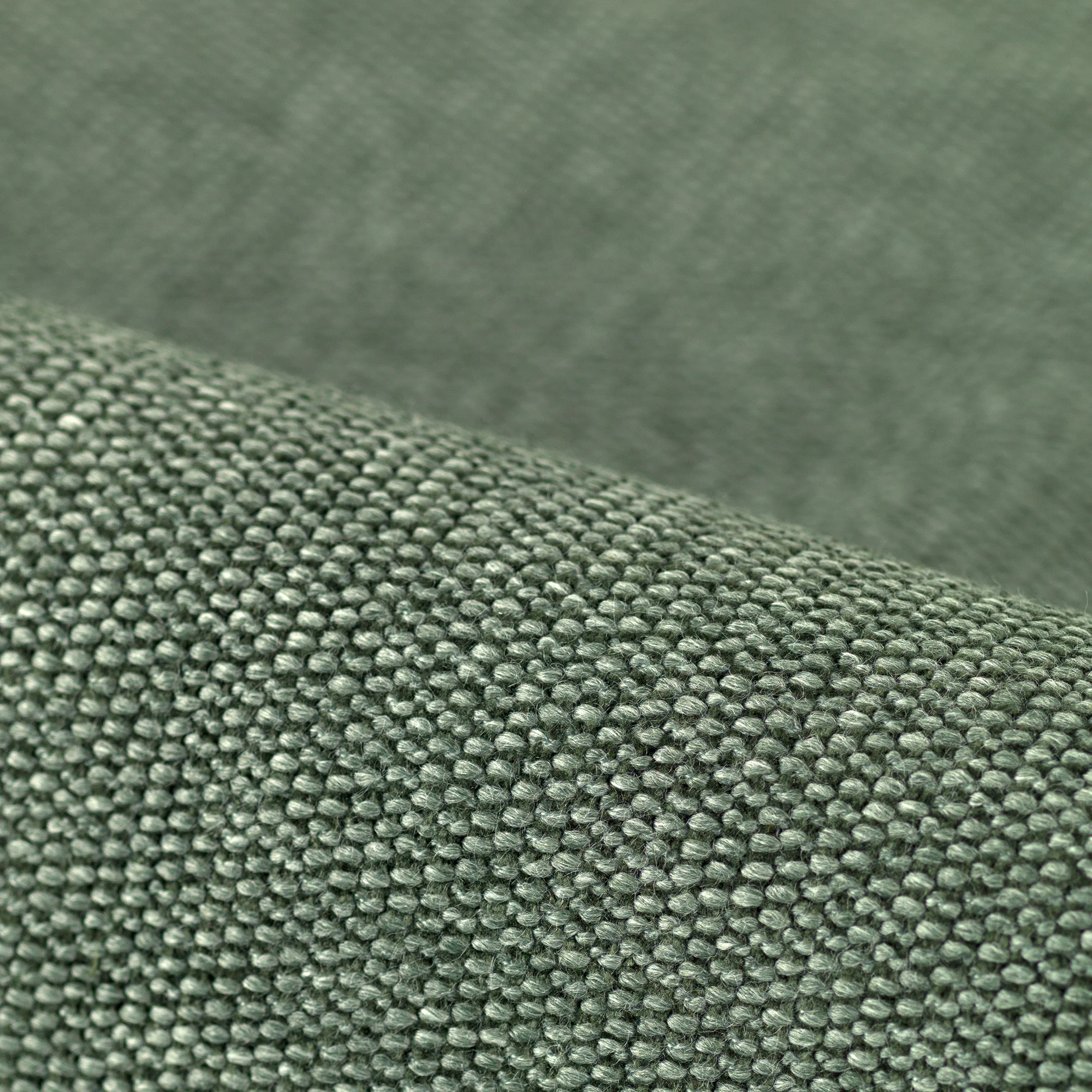Prairie upholstery fabric close-up with a soft woven texture and gentle sheen, made from a blend of viscose, polyester, cotton, and polyamide, featuring a naturally bleached effect and rounded yarn structure, ideal for modern living rooms and commercial seating interiors, OEKOTEX certified.