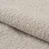 Serra upholstery fabric close-up showing a luxurious dense woven texture, made from a refined blend of acrylic, polyester, cotton, linen, viscose, and polyamide, featuring soft earthy tones and a natural yet premium look, designed for heavy-duty upholstery use, OEKOTEX certified.