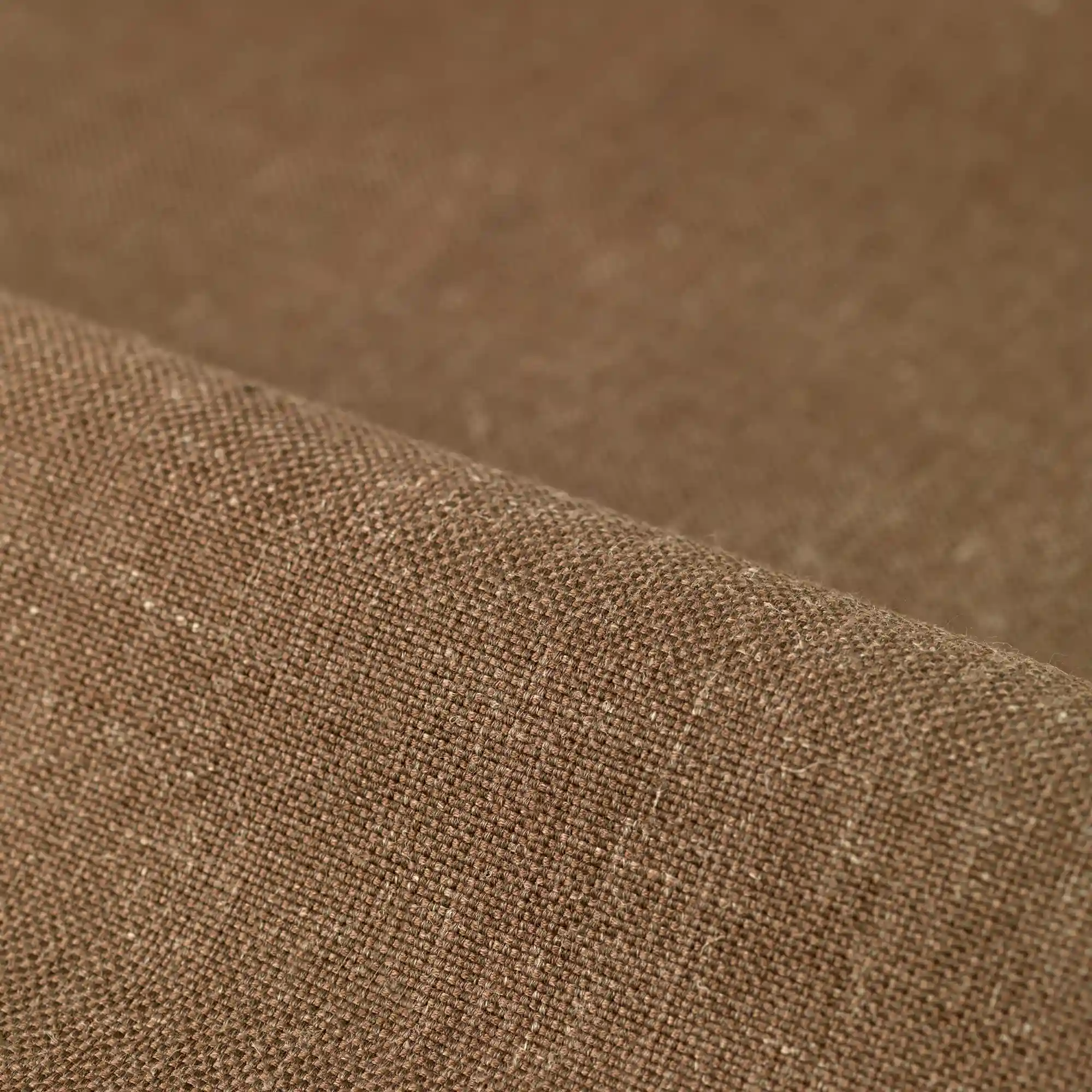 Strand upholstery fabric close-up with a refined woven texture and natural linen look, made from a blend of acrylic, linen, and polyester, featuring a smooth contemporary finish suitable for residential and commercial upholstery, OEKOTEX certified.