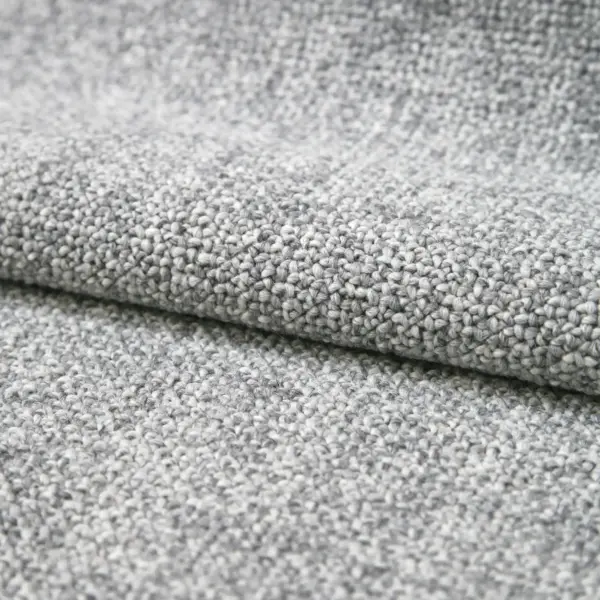Taro upholstery fabric close-up with a dense woven texture, made from a blend of new wool, polyester, and cotton, featuring a soft tactile feel and timeless earthy tones, designed for elegant and durable interior upholstery, OEKOTEX certified.