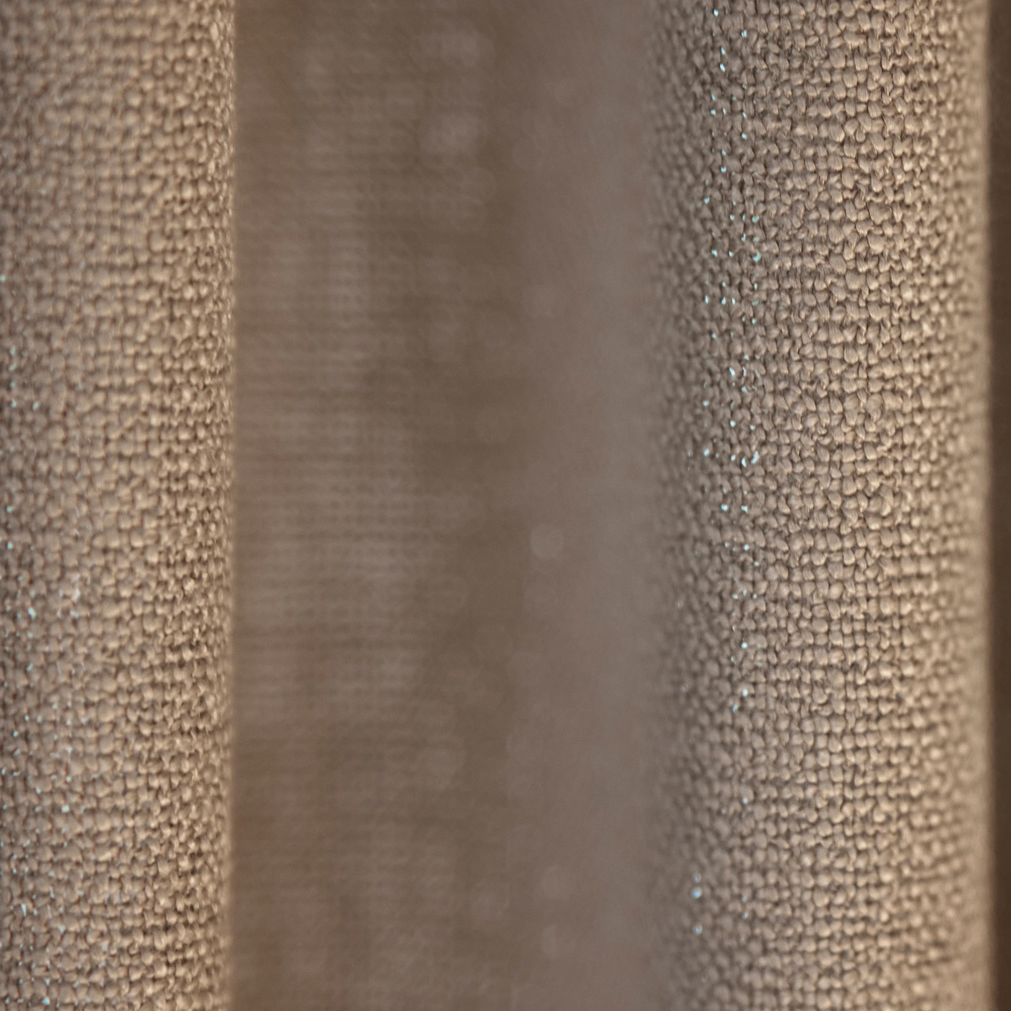 Vela curtain fabric close-up with a soft, voluminous closed weave, made from 100% recycled polyester, featuring a subtly irregular natural texture and refined sheen, suitable for elegant floor-to-ceiling curtains and Roman blinds.